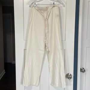Cream canvas pants. Wide leg.